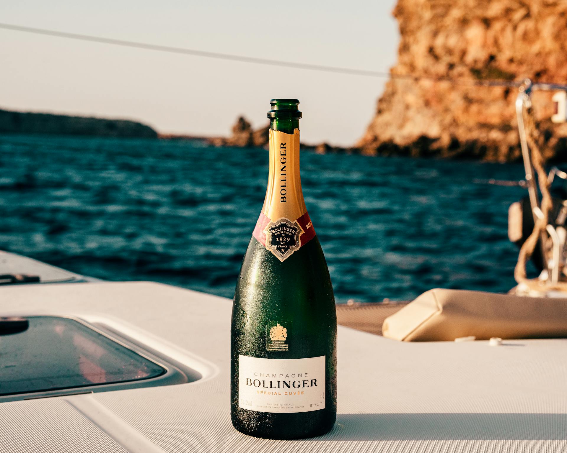Champagne on the deck of a yacht in the ocean