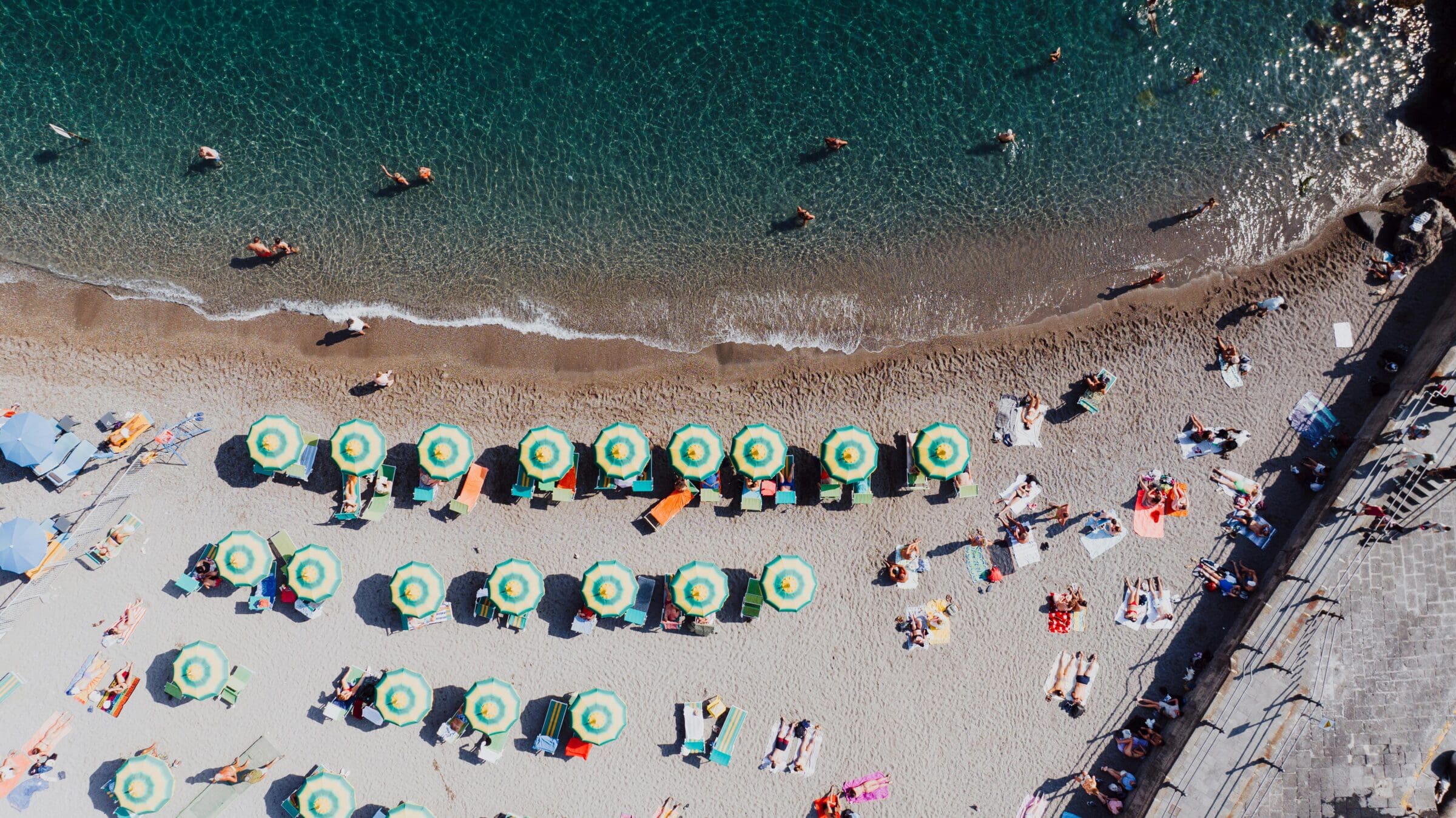 People and Beach Umbrellas on Beach
