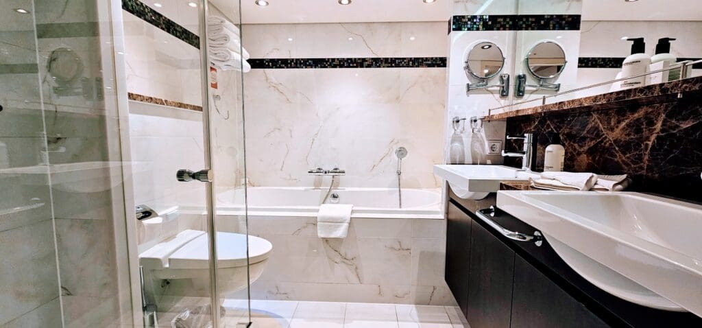 large tub and double sink inside cabin 304 of the AmaReina