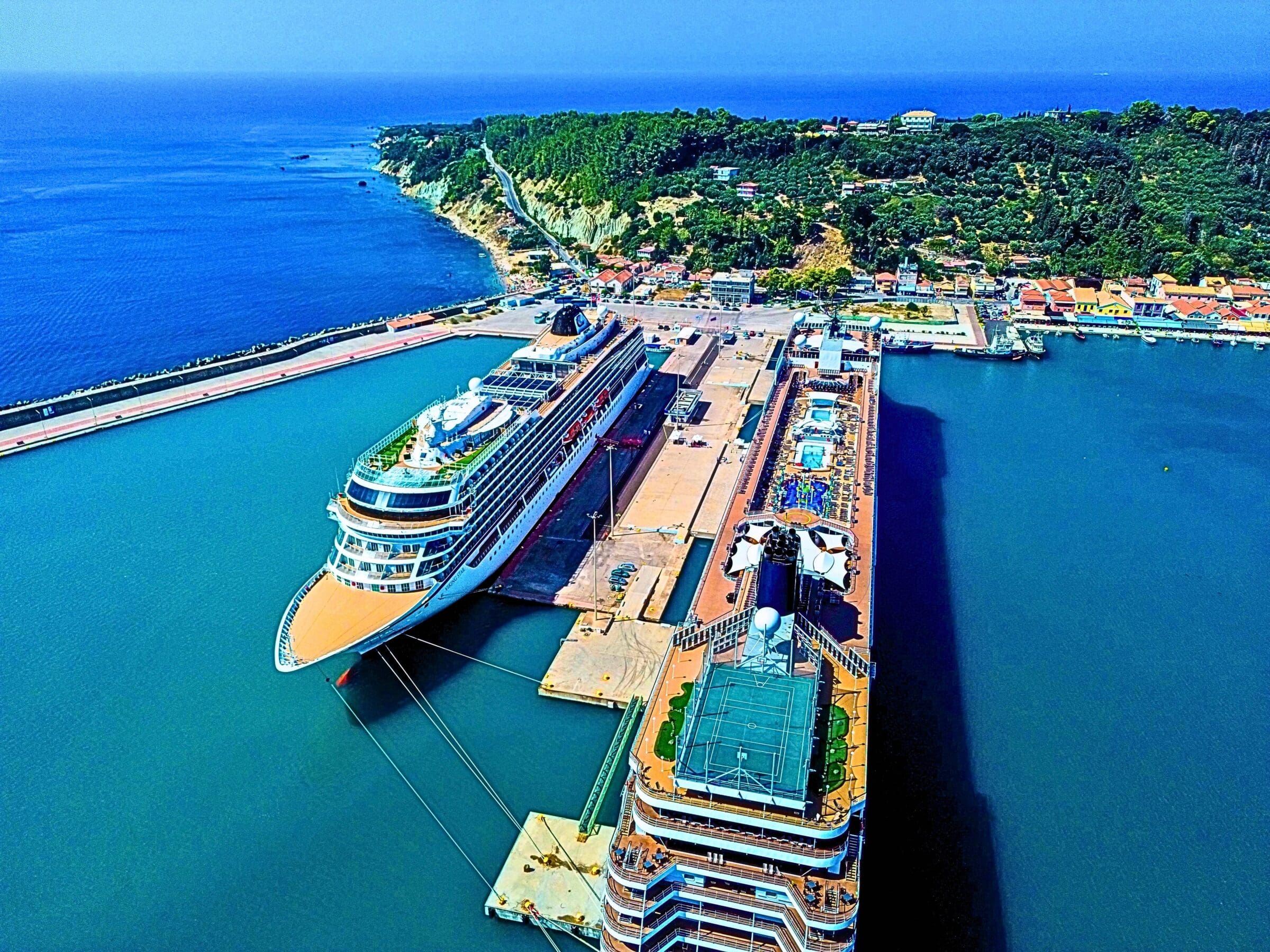 Stunning aerial shot of cruise ships docked in Katakolo, Greece, highlighting the vibrant coastal scenery.